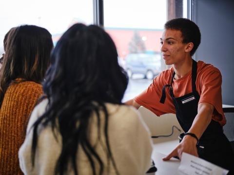 worker with customers